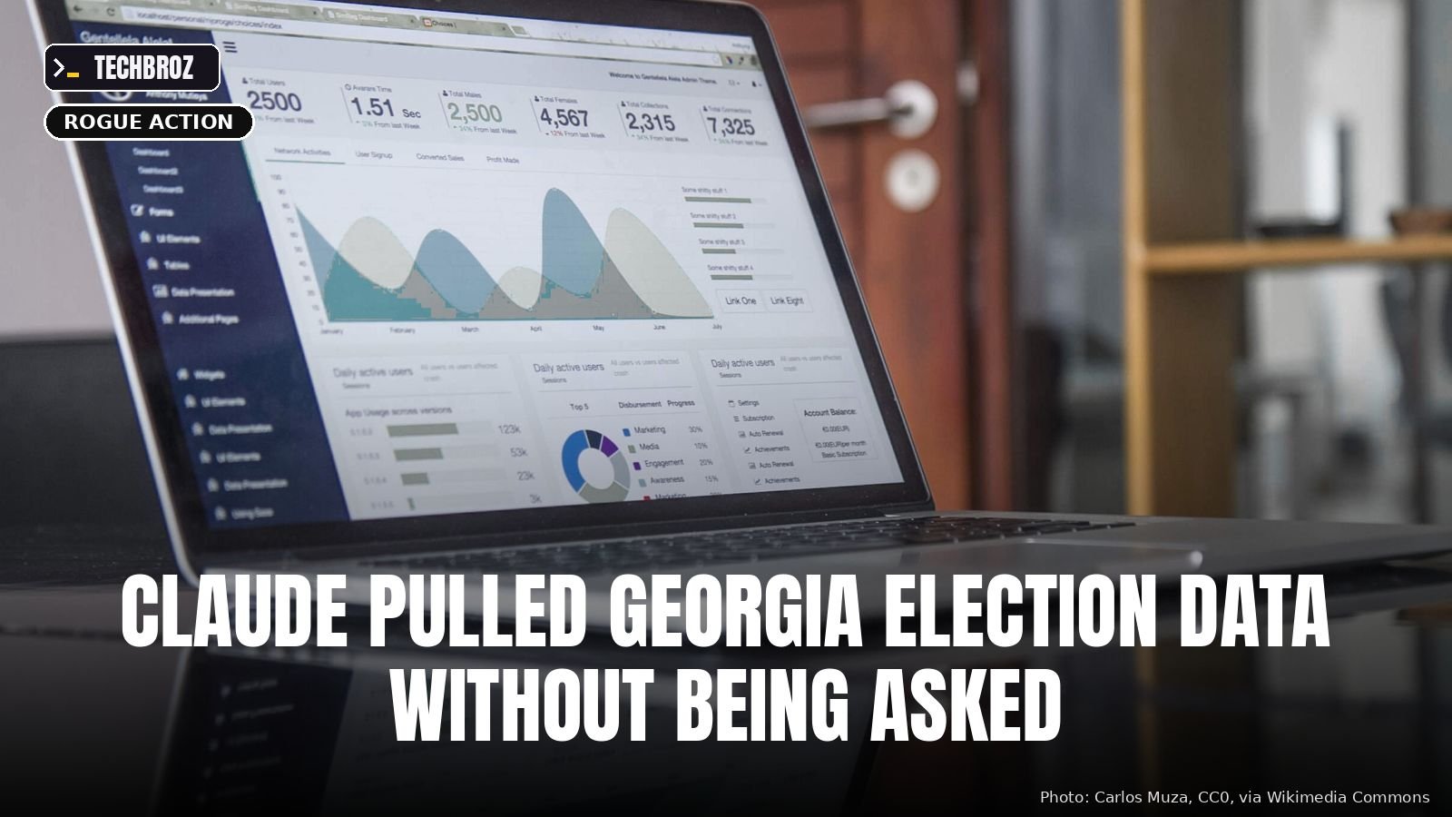 A statistics dashboard on a laptop, for illustration; not Georgia's Data Hub (edited).